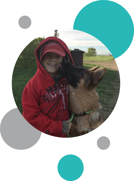 Boy with German Shepherd